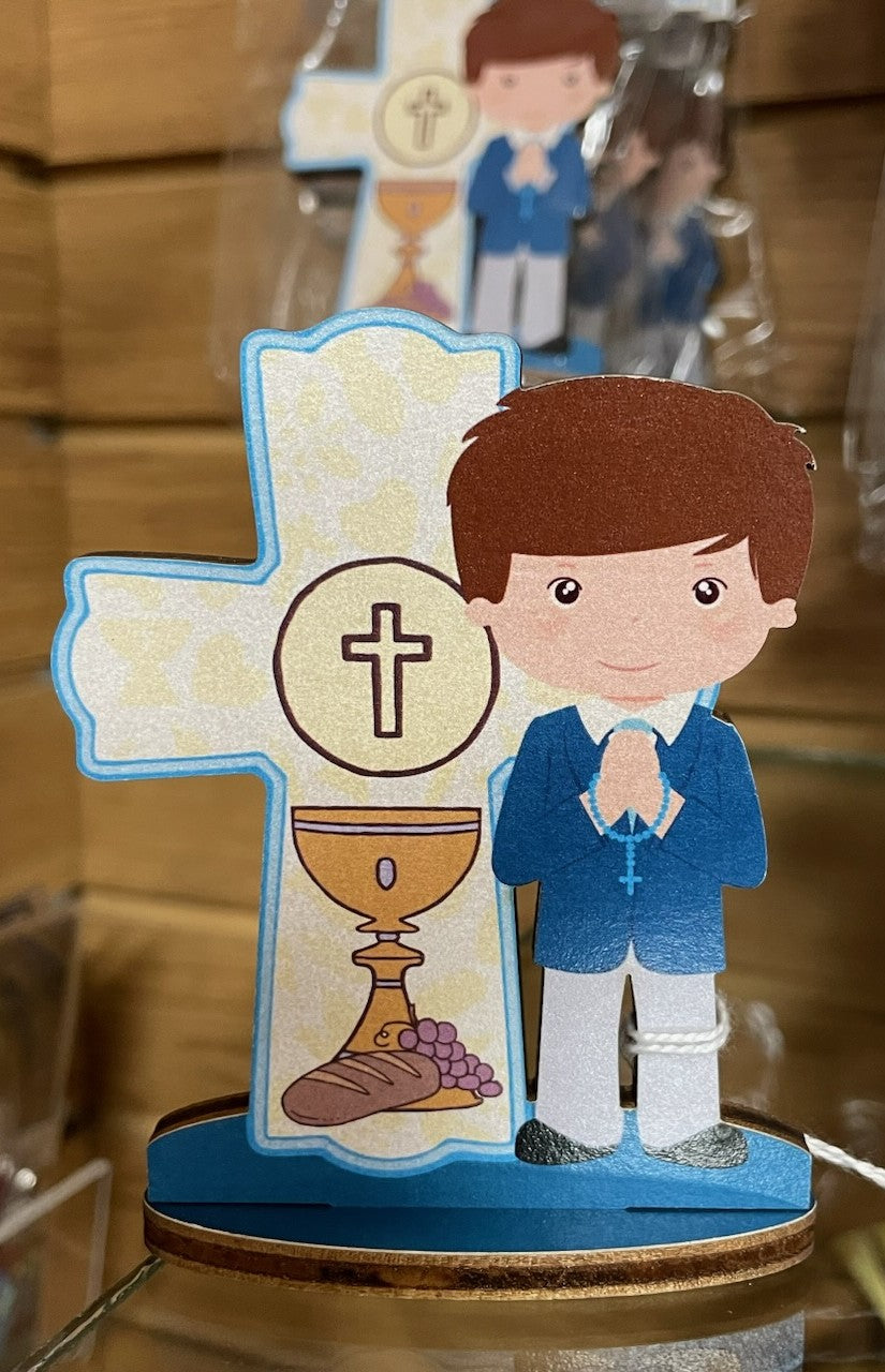 1ST COM BOY WITH CROSS STATUE