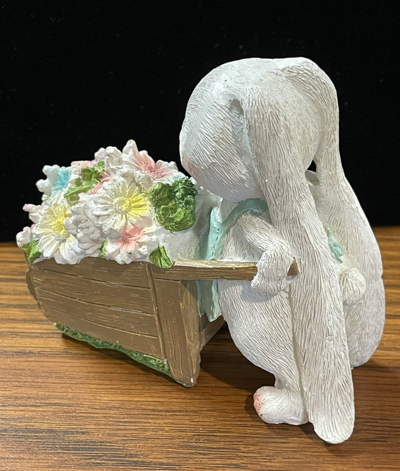 BUNNY WITH BLOOMS STATUE BLUE